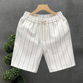 Men's black and white striped fleece-lined casual shorts with an elastic waistband