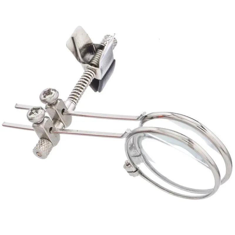 Auxiliary reading glasses magnifier with metal double clip and glass lens.