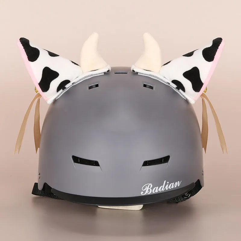 A plush fabric cartoon helmet cover set for adults, showing character designs like a bear and dinosaur for cosplay.