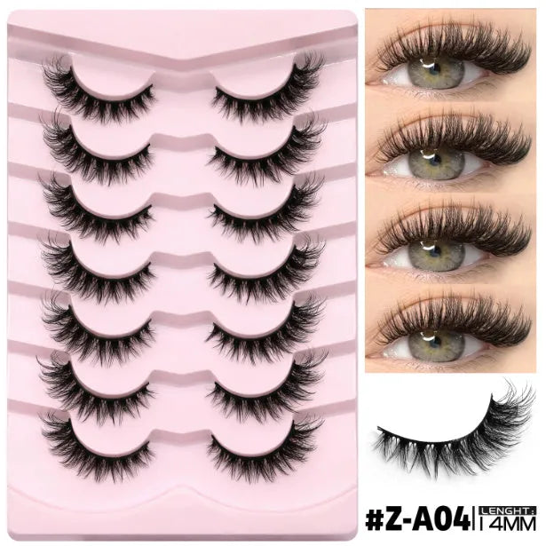 Box of natural long, thick false eyelashes made from artificial fibre with included glue tube.