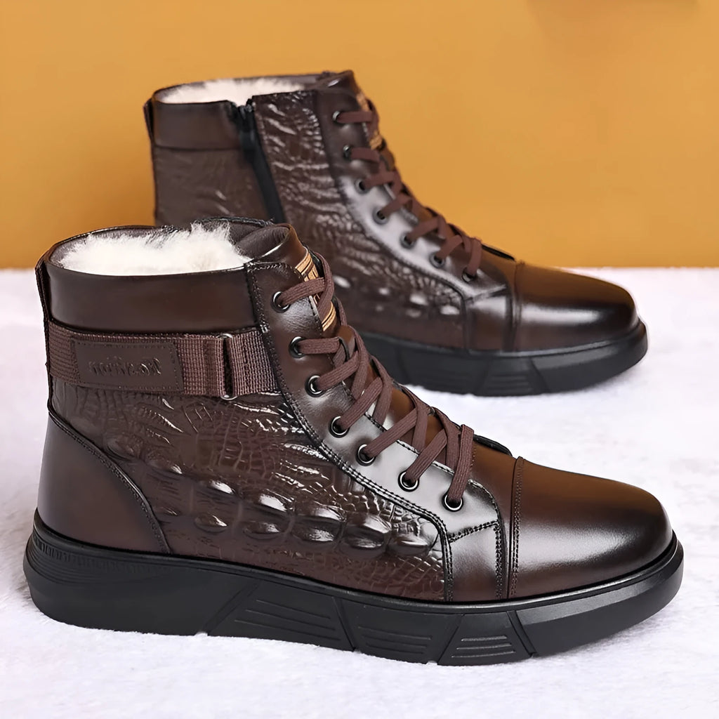 Brown genuine leather winter boots with fur trim and lace-up front, resting on a surface.