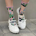 Women's silver creative lace-up bow sports shoes with mid heel and round toe on a white background.