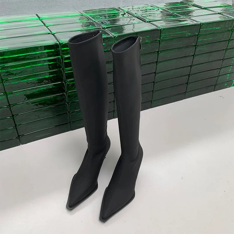 Women's black pointed toe stiletto heel boots with a back zip closure