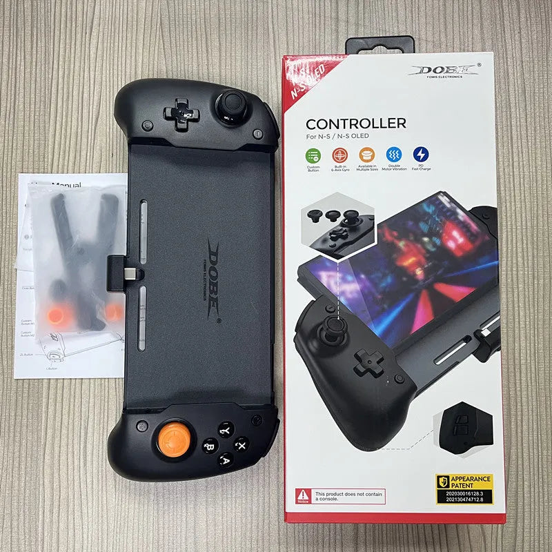 Black and white portable Nintendo Switch gamepad controller showing USB-C port.