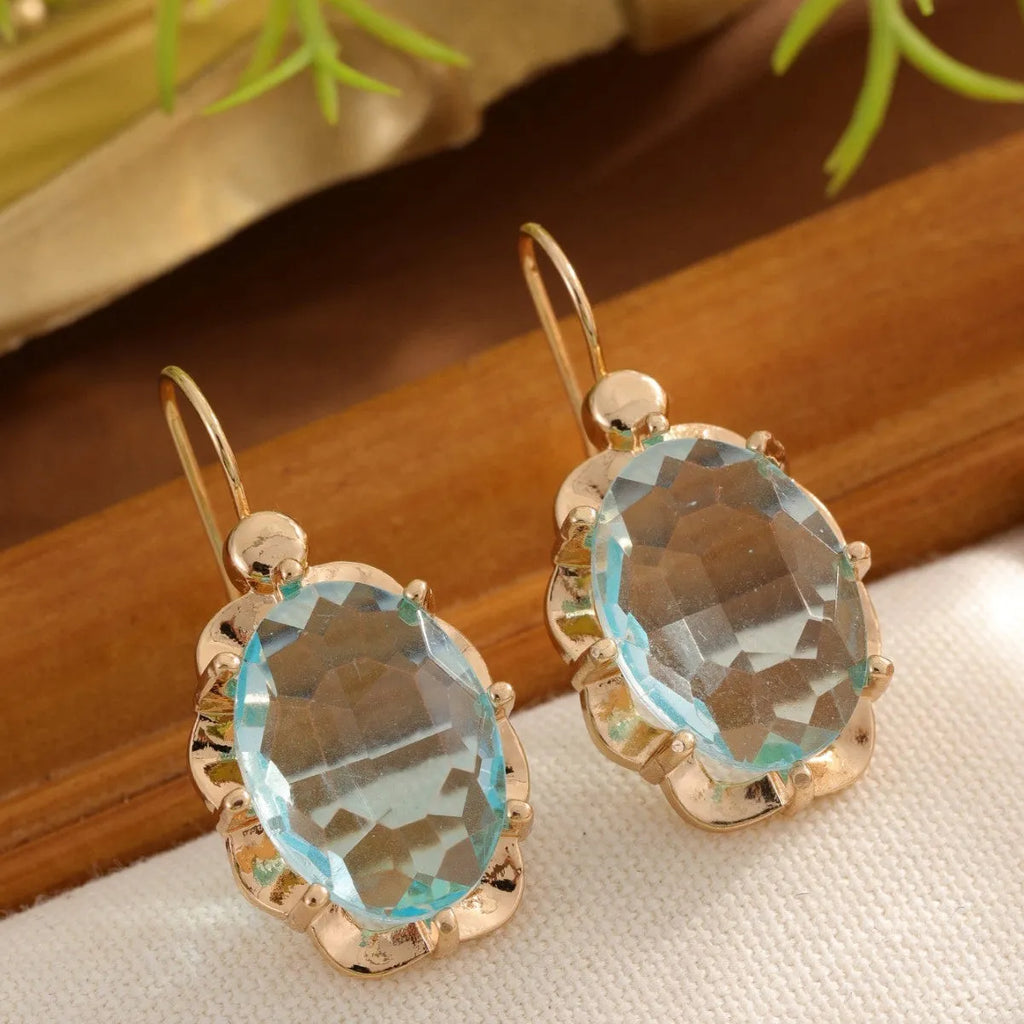 Pair of diamond studded earrings in polished zinc alloy, available in light blue, rose red, and royal blue colours