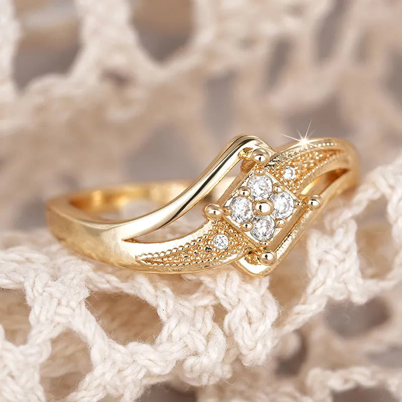 Copper diamond-shaped geometric ring with micro inlaid zircon stones in yellow gold colour
