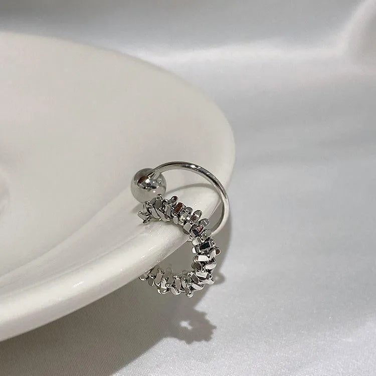 Geometric irregular shaped ear clip earrings with a frosty B4710# finish.