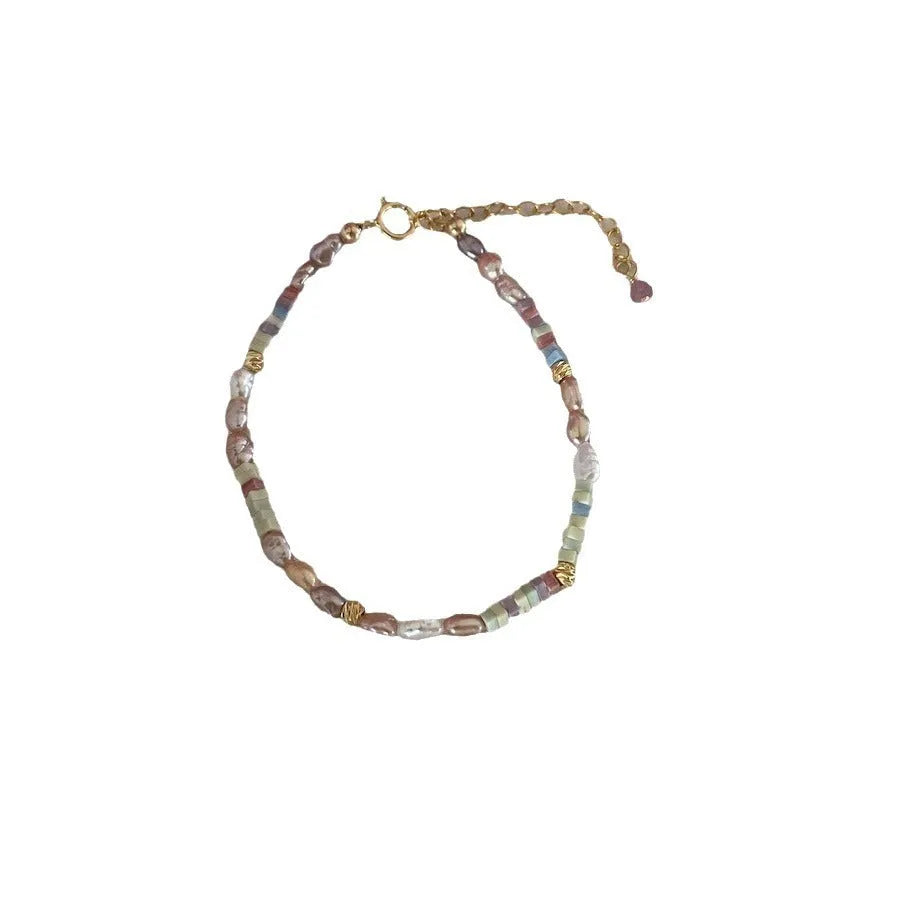Purple pearl bracelet and matching necklace set with irregular freshwater pearls on gold gilded silver