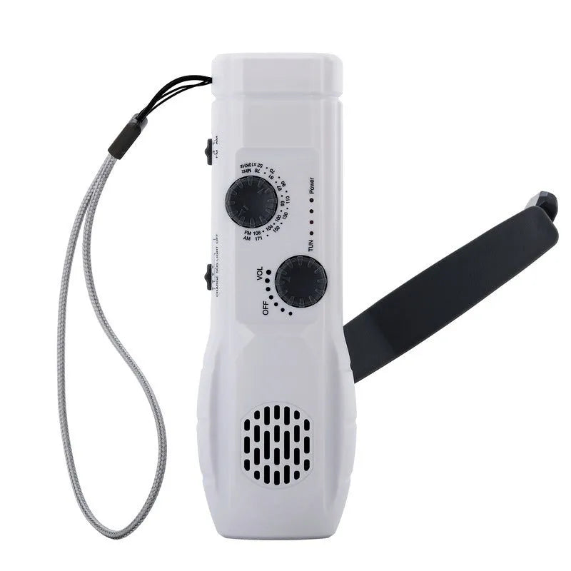Hand-cranked emergency radio flashlight with USB charging port built-in speaker and manual tuning dial in black