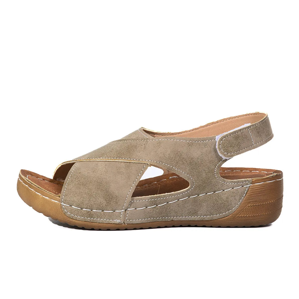Women's brown Roman platform sandals with a skirt detail and Velcro strap.