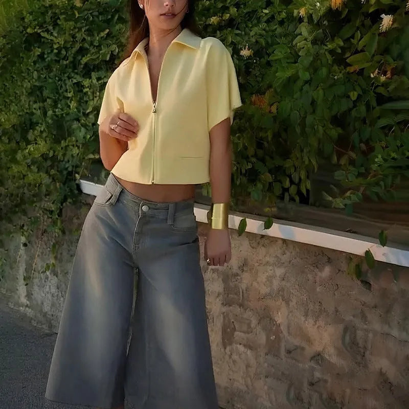 Casual polyester outerwear top in loose fit with short sleeves available in black, white or yellow colours