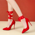 Women's black high heel shoes with pointed toe and fabric strap, 12cm heel