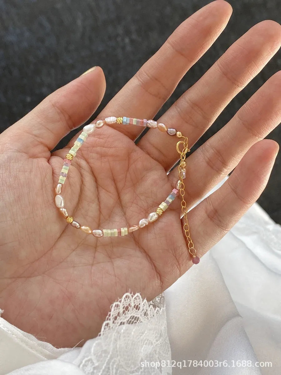 Purple pearl bracelet and matching necklace set with irregular freshwater pearls on gold gilded silver