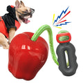 Green plastic dog toy with food dropping ball and molar shape for outdoor play