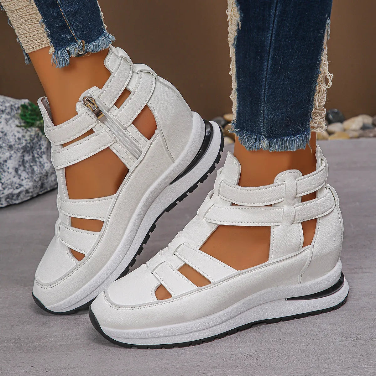 Women's black close-toed hollow-out platform sandals with Velcro fastening showing round toe design
