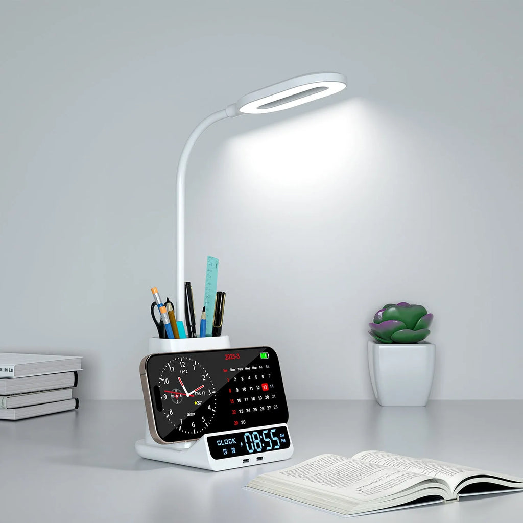 Modern desk lamp with wireless charging pad, pen holder compartments, and storage box