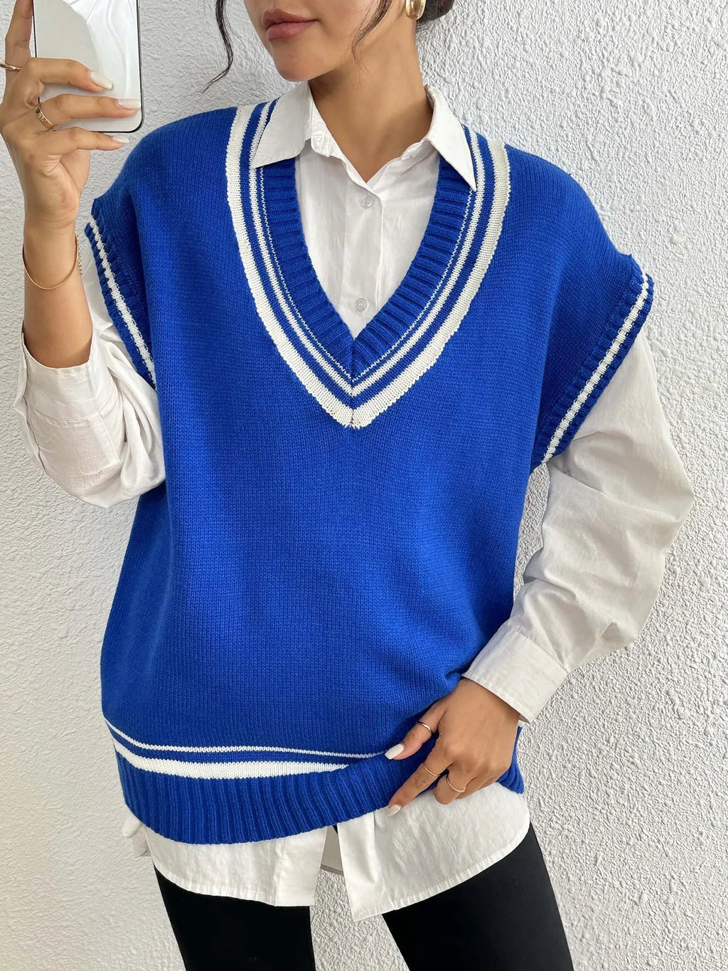 Women's college style vest sweater in acrylic polyester blend fabric, loose fit, available in black blue coffee colours