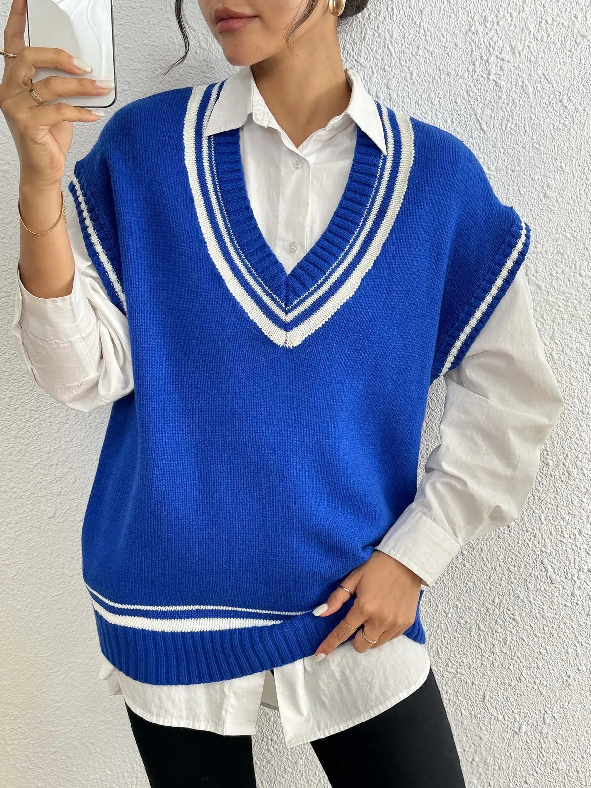 Women's college style vest sweater in acrylic polyester blend fabric, loose fit, available in black blue coffee colours