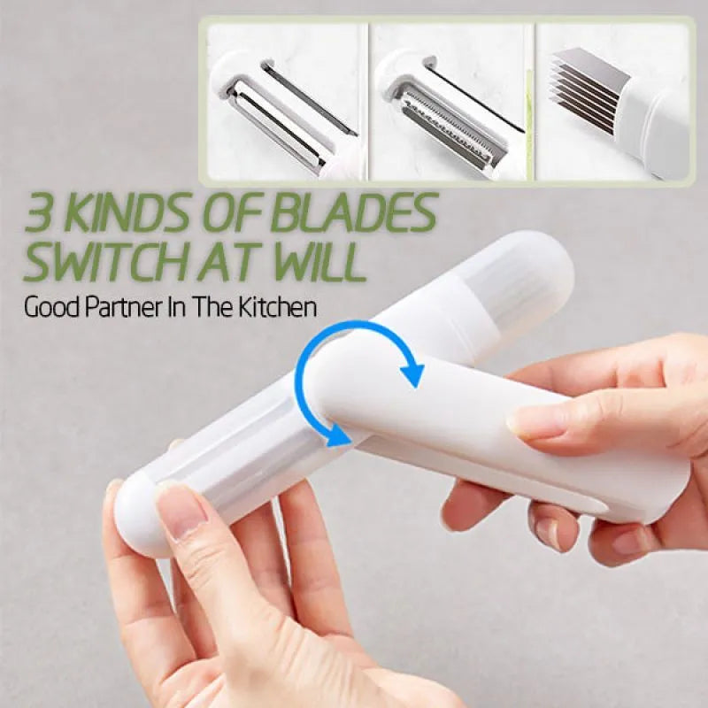 White 3 in 1 rotary paring knife with 360 degree rotating stainless steel blade on a kitchen counter
