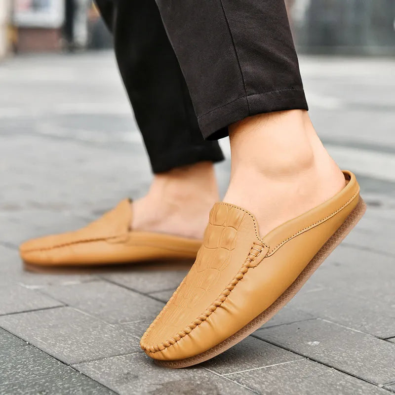 Men's black breathable semi-slippers with a textured rubber sole, shown from a side angle.