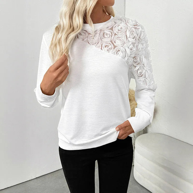 White floral print long sleeve polyester top with loose fit and regular sleeves