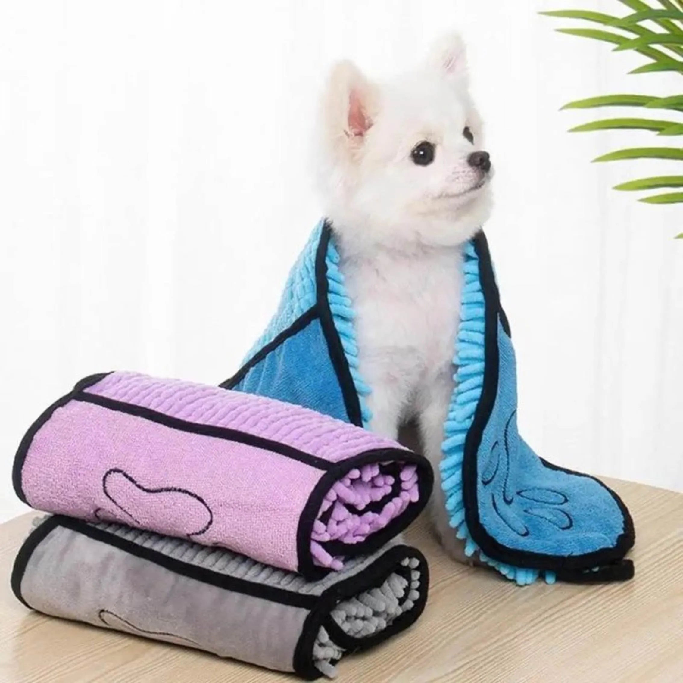 Blue pet bath robe towel for dogs and cats on a white background.