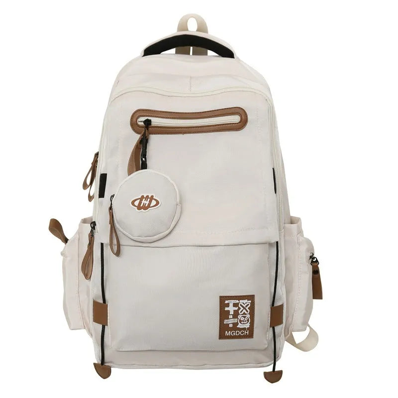 Large capacity nylon backpack for middle school students with curved shoulder straps in multiple colour options