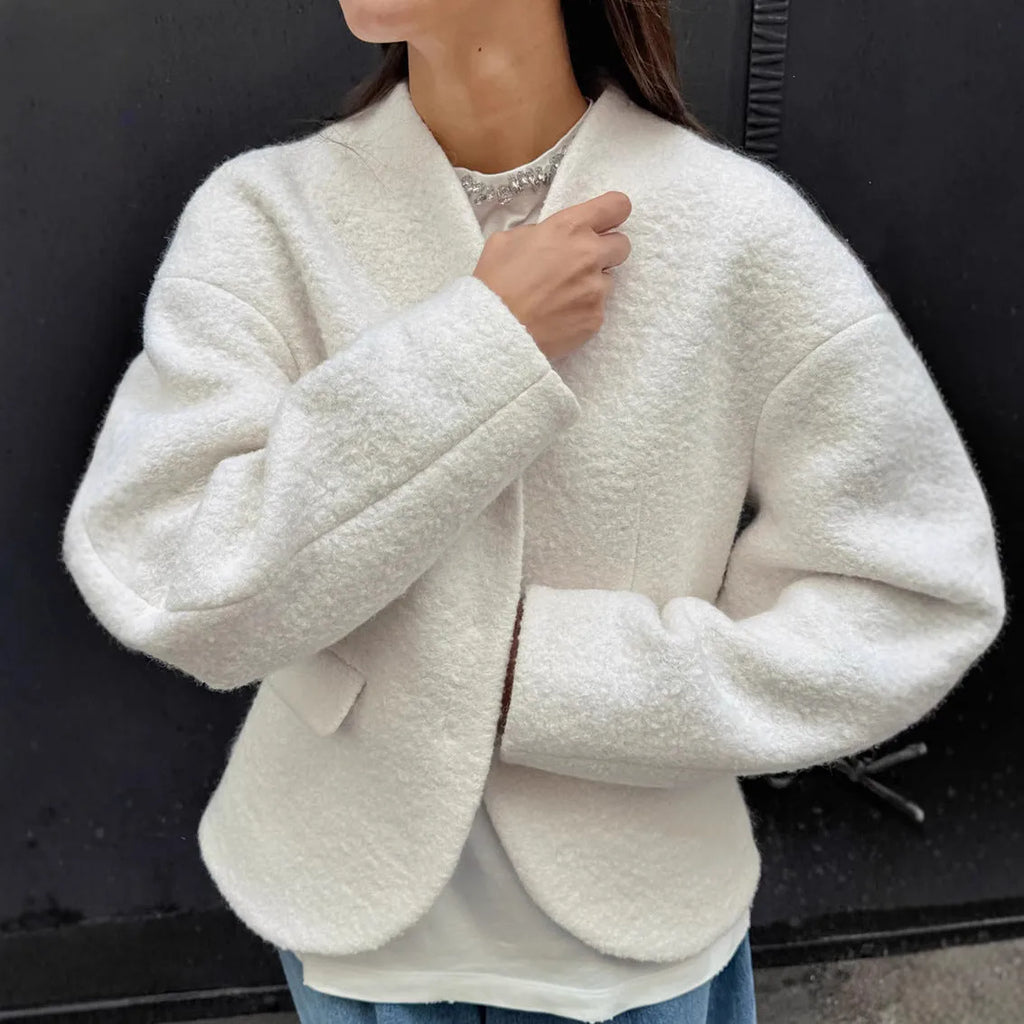 Women's coarse woolen thick polyester coat in solid white with raglan sleeves and stitching details