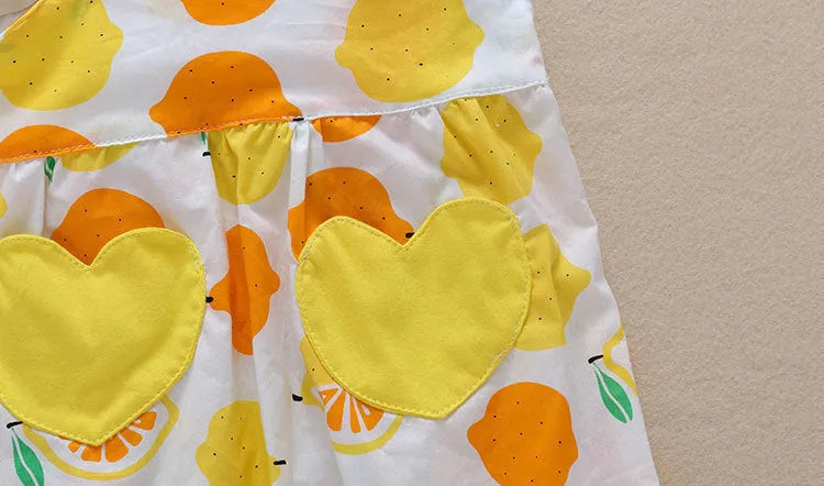 Cotton summer baby romper triangle jumpsuit in yellow with removable hat on white background