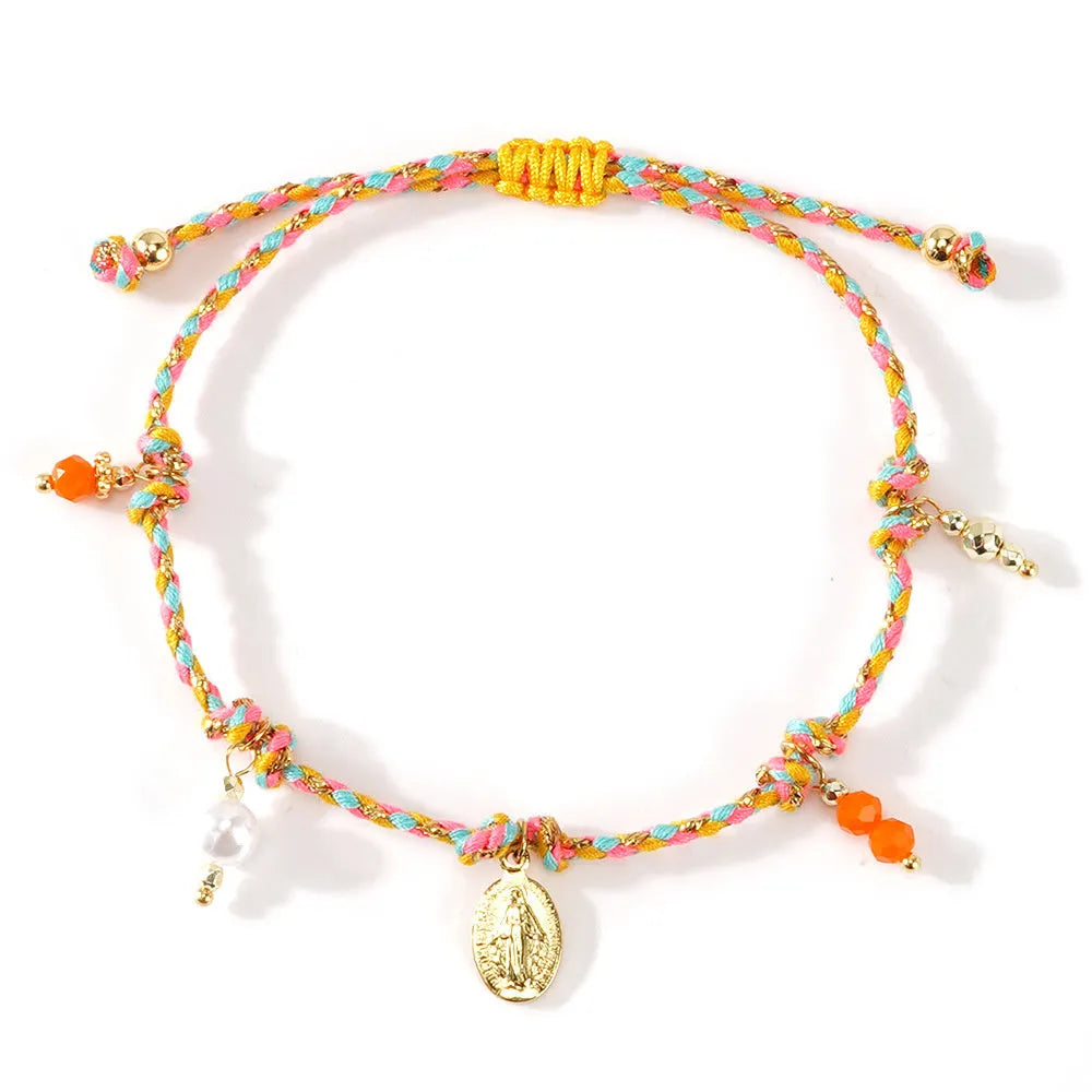 Close-up of a colourful hand-woven braided rope bracelet for women in ethnic style.