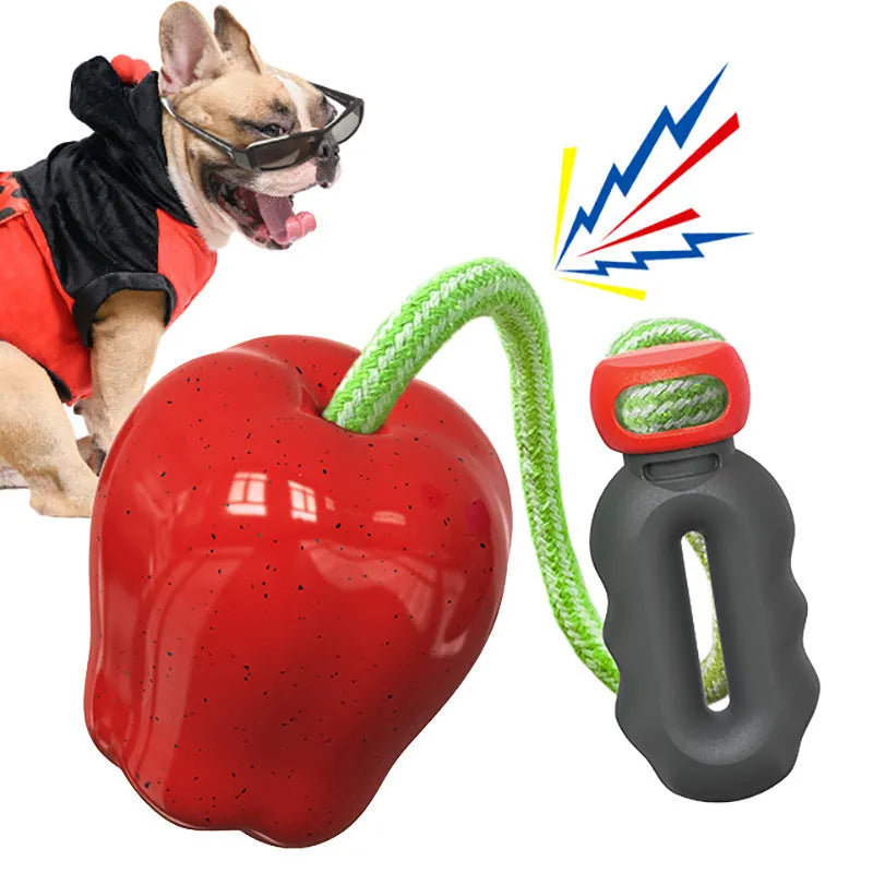 Green plastic dog toy with food dropping ball and molar shape for outdoor play