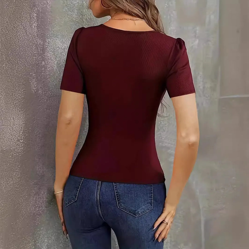 Women's slim fit knitted short sleeve top with low neckline in wine red colour