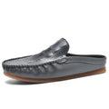 Men's black breathable semi-slippers with a textured rubber sole, shown from a side angle.