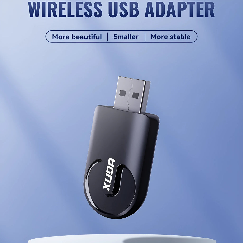 Small black wireless CarPlay USB adapter with compact rectangular design.