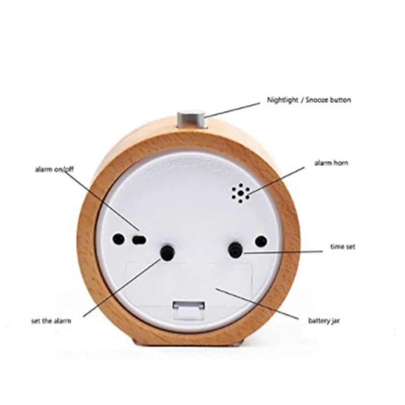 Solid beech wood silent snooze alarm clock with a 4-inch white dial on a wooden base.