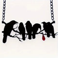 Black gothic crow necklace with detailed bird pendant on cross chain for women