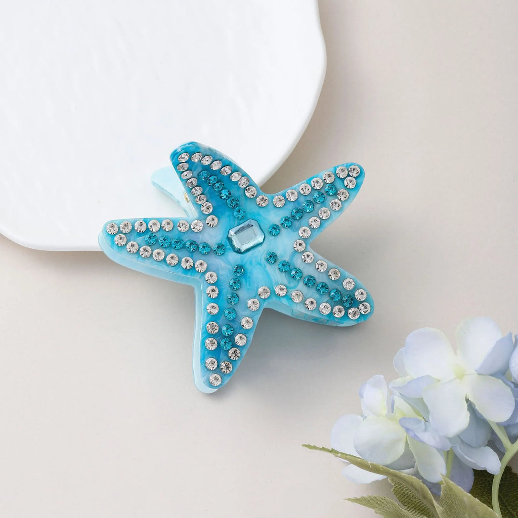 Acrylic starfish hairpin with diamond encrusted surface in blue colour, 8cm length
