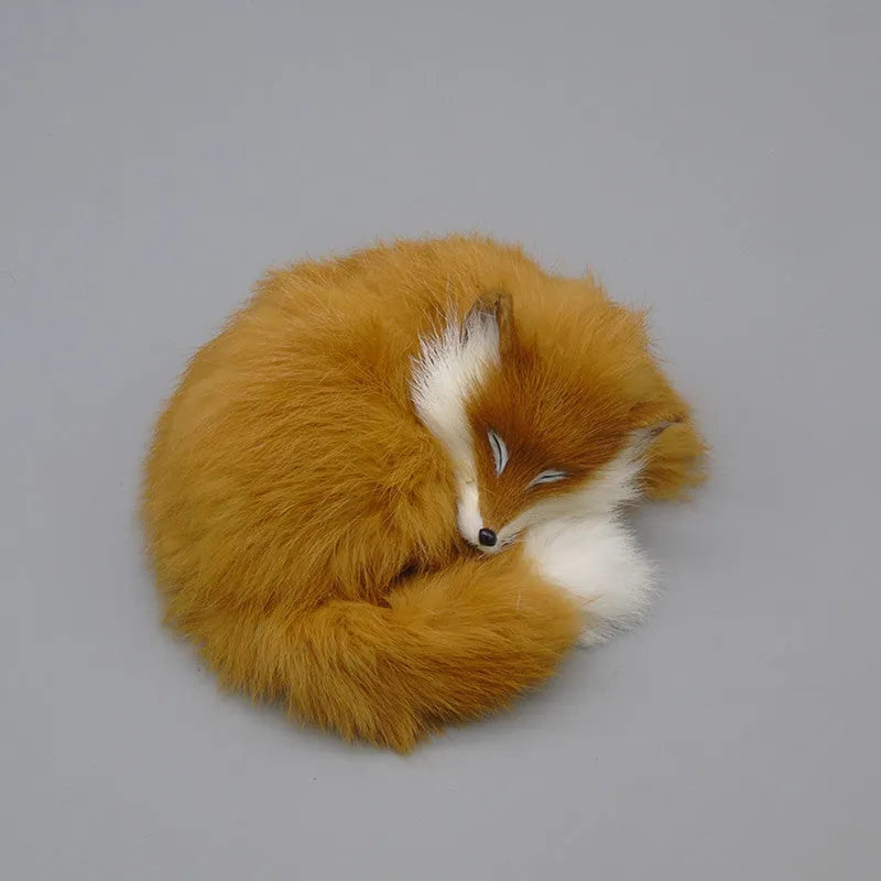 Artificial white fox fur car decoration on vehicle dashboard showing soft texture and compact size