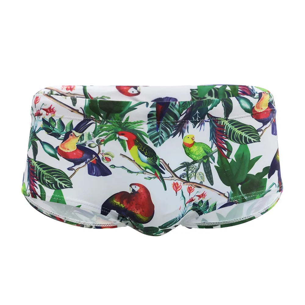 Men's floral and bird print nylon swimming trunks in boxer brief style.