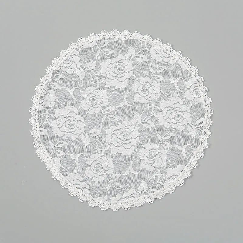 Round white bridal head cover with floral decoration measuring 30cm diameter