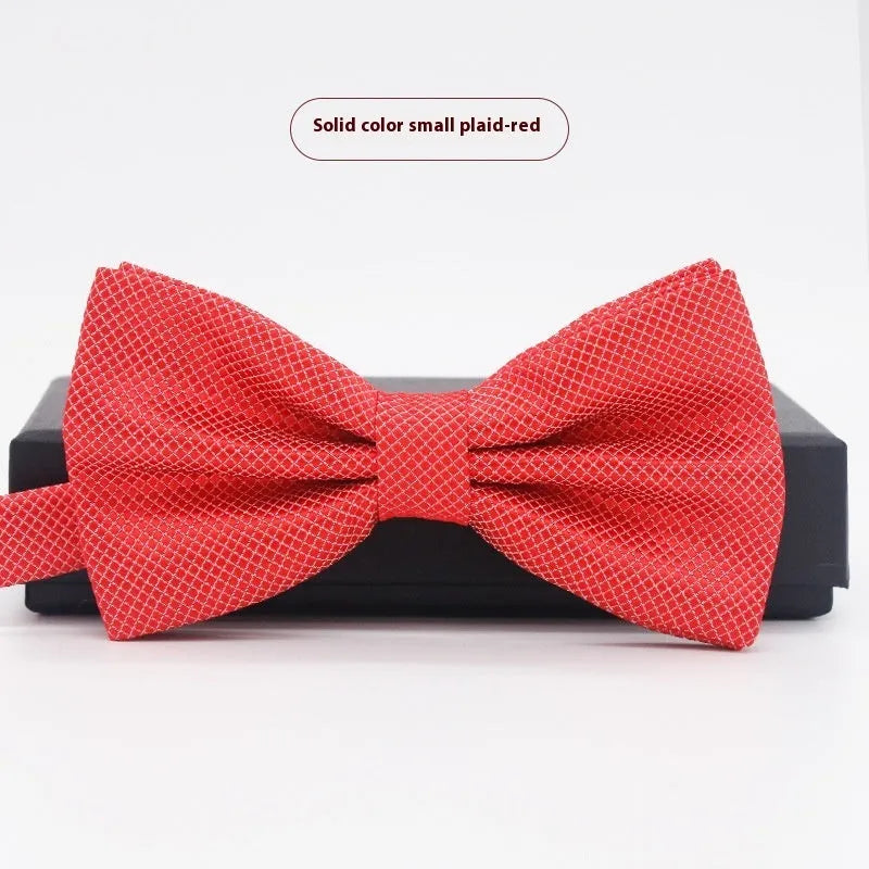 Solid colour polyester bow tie with flat head design measuring 12cm by 6cm