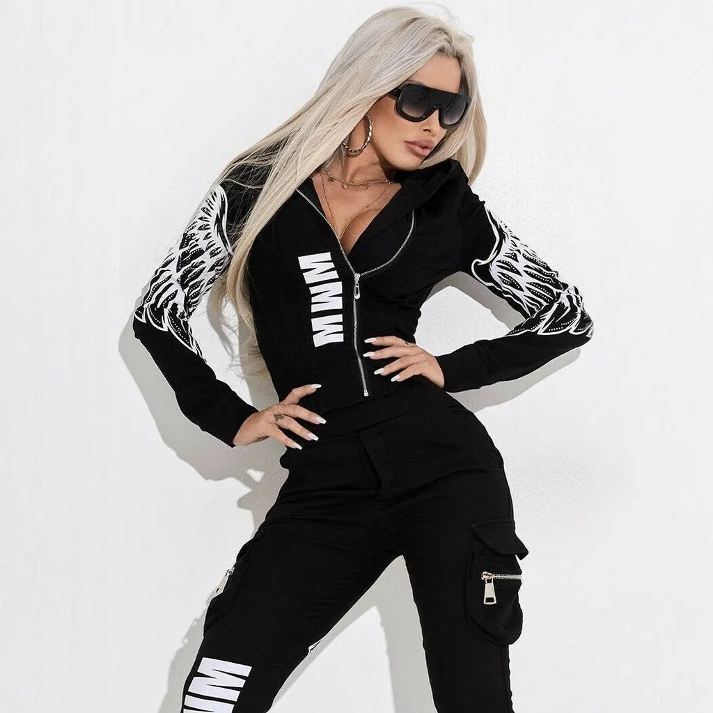 Black women's casual hooded suit with wings graphic print, featuring a zip-front top and matching trousers.