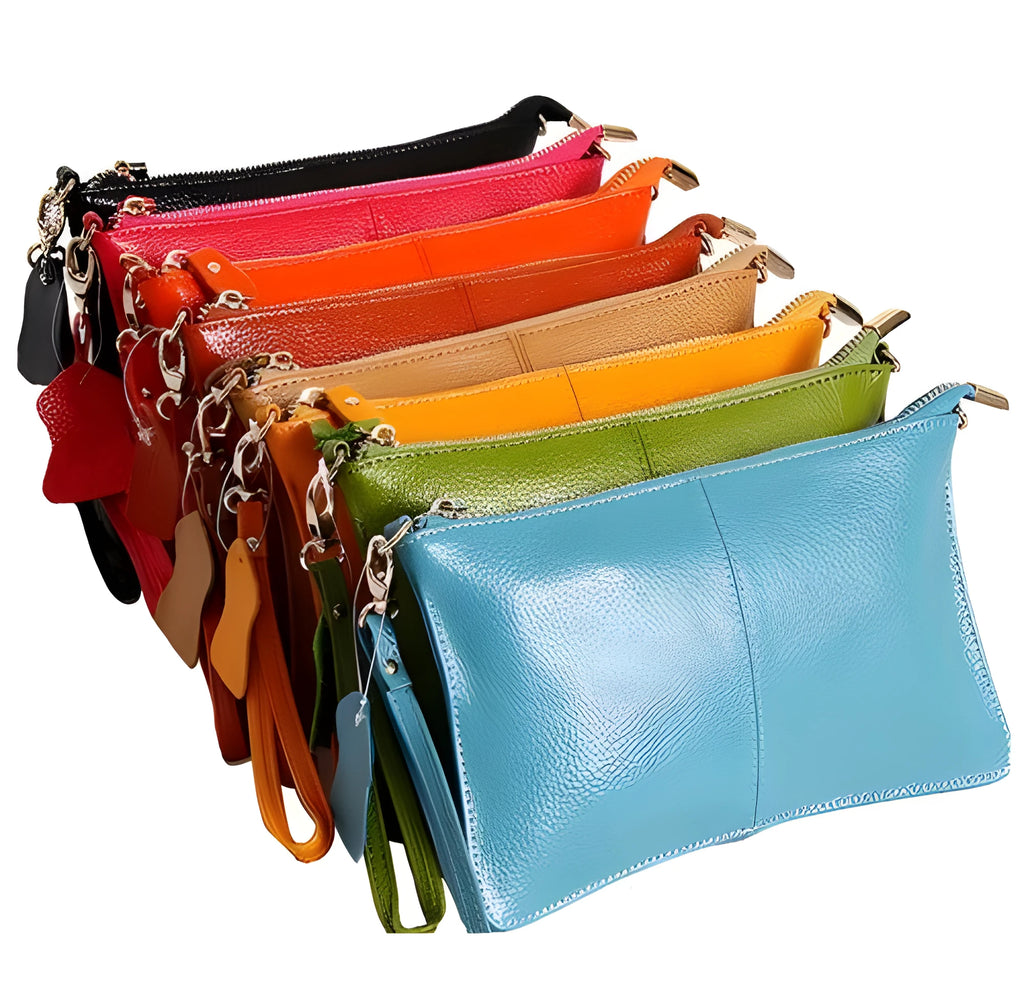 Structured cowhide lady slant bag in apricot colour with hand strap and shoulder strap, showing slim profile.