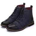 Men's black leather motorcycle boots with a buckle detail and rubber sole