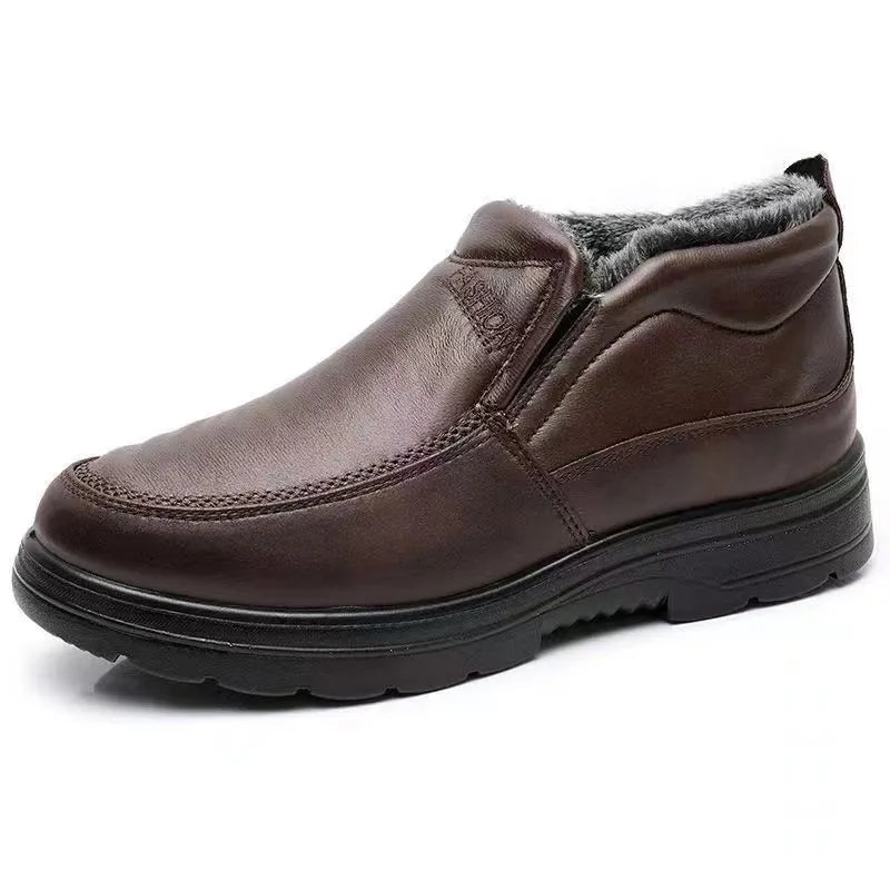 Men's black winter slip-on shoes with fleece lining and rubber sole on grey background