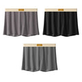 Men's solid colour loose Ice Silk underwear briefs on a neutral background