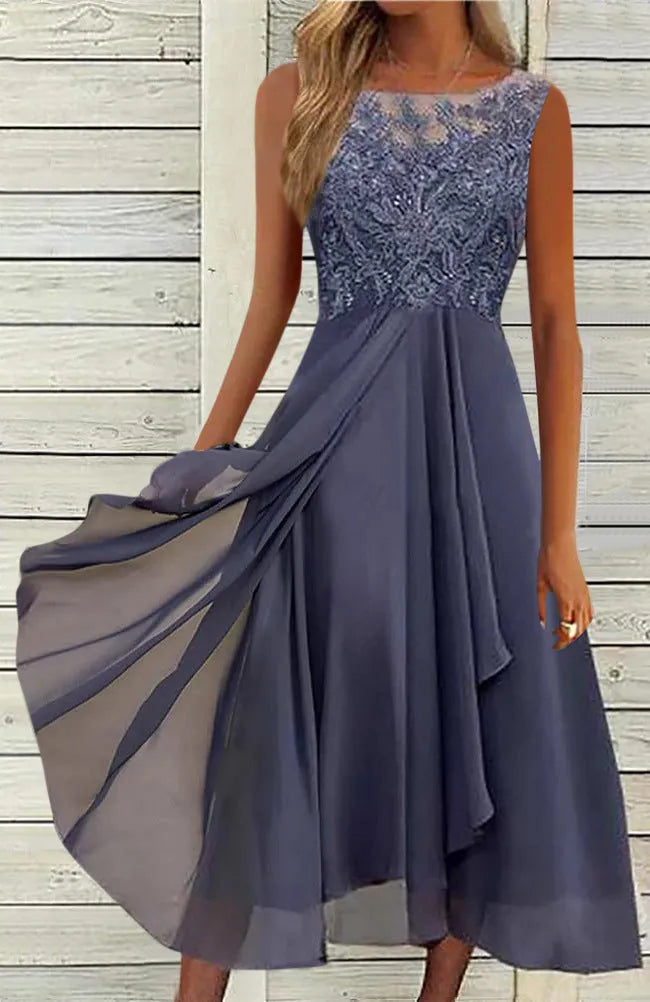 Women's sleeveless lace chiffon dress in green, purple, or blue with hollow-out stitching.