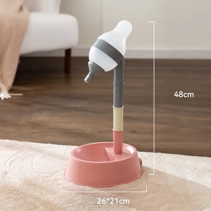 Green adjustable pet water dispenser showing height adjustment bars and ball-tip drinking nozzle