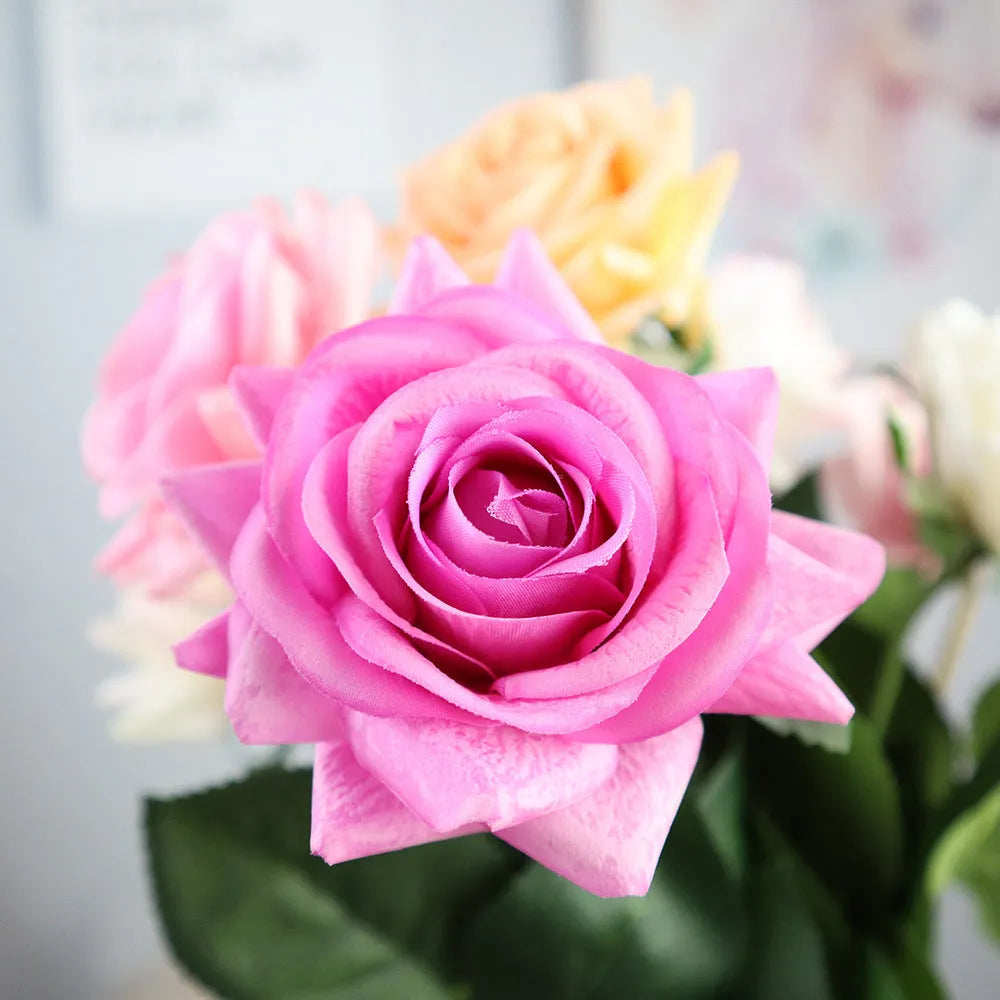 Artificial silk touch rose flower with red petals on a green plastic stem, showing approximate 42cm length.