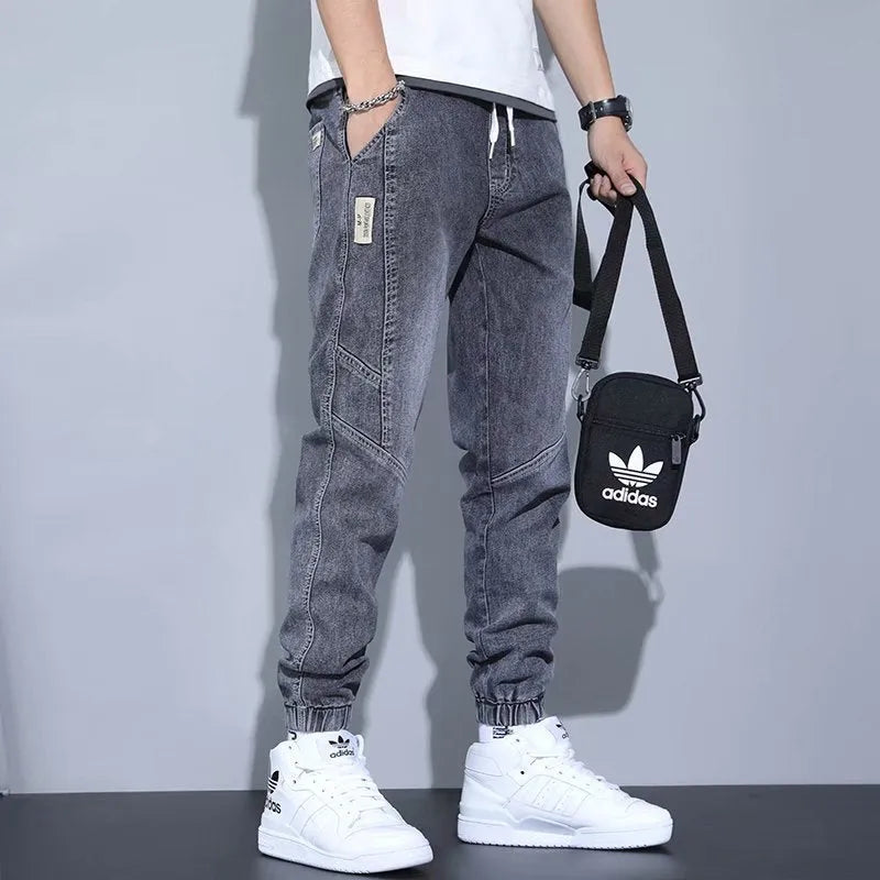Men's slim fit high-waist ankle-tied harem jeans in denim cotton, available in black, blue, gray